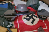 Detuvieron a un hombre acusado de tenencia de material y armamento vinculado con el régimen nazi